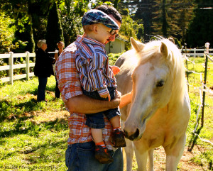 Jewel greeting one of our younger guests at the open house.